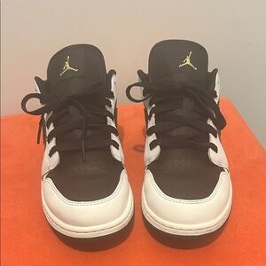 Jordan 1 Low White Black Metallic Gold Swoosh Sneakers